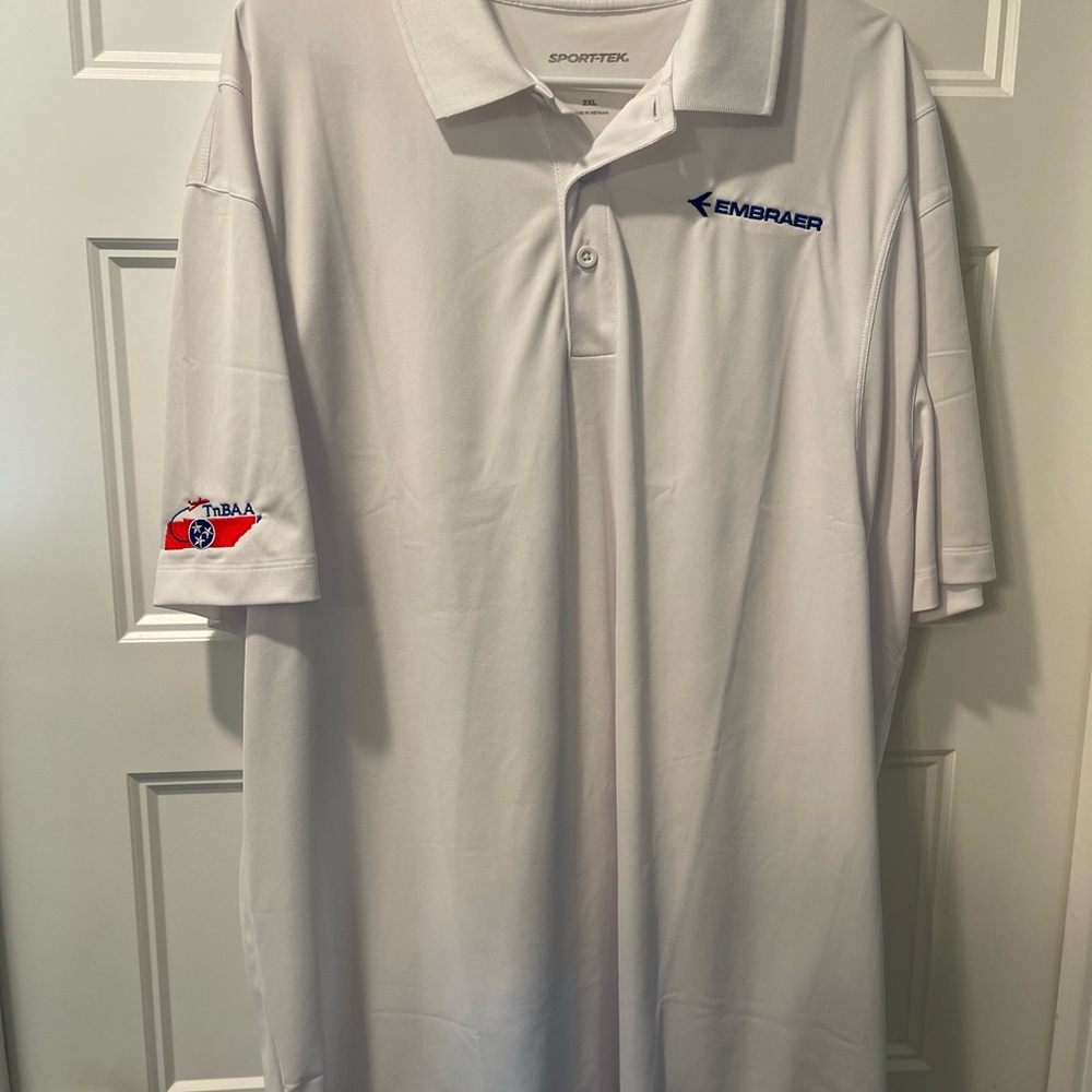 Sport-Tek White Polo Shirt with Embraer TnBAA Embroidery